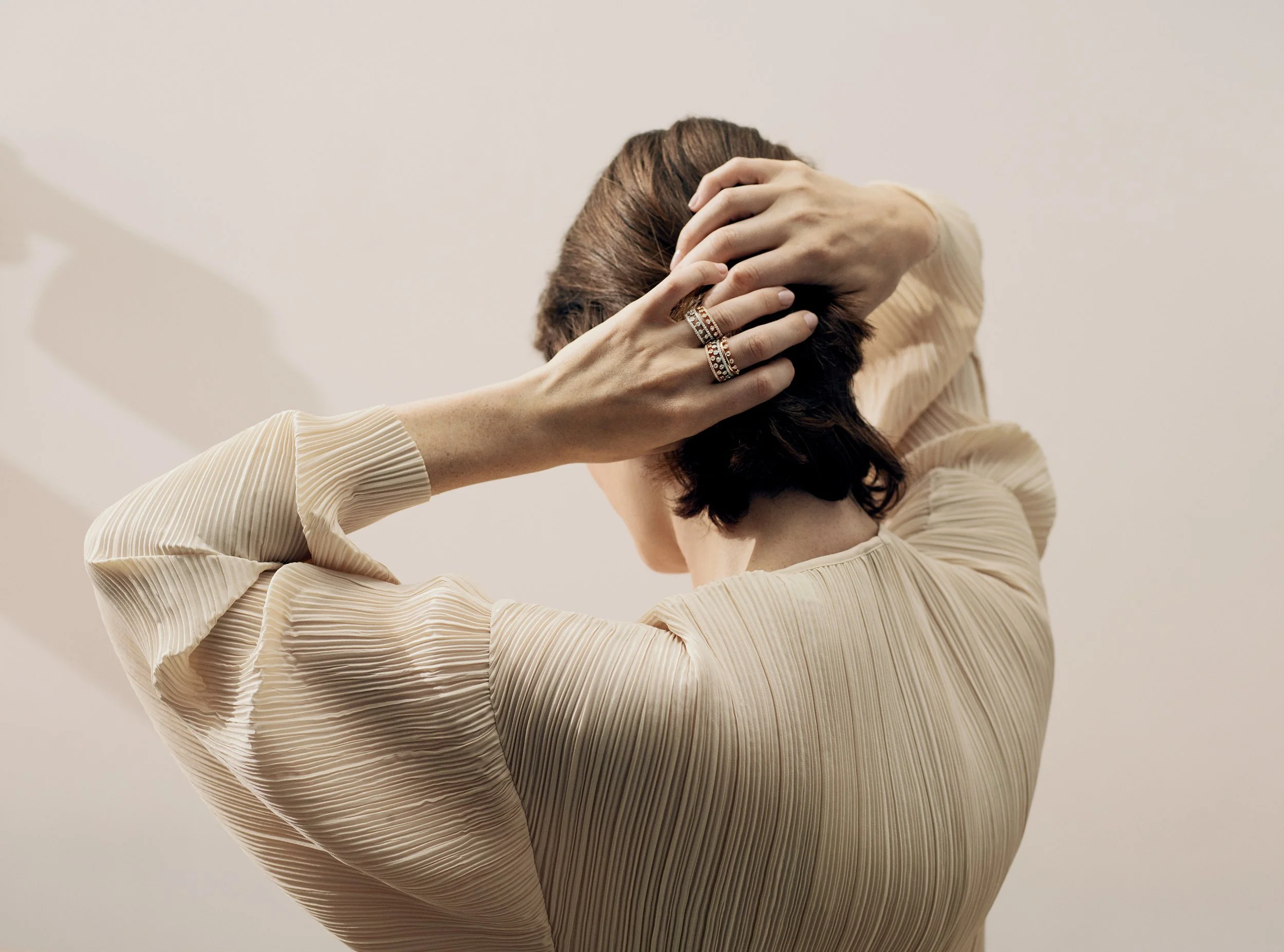 Editorial campaign photograph — model with gold jewellery